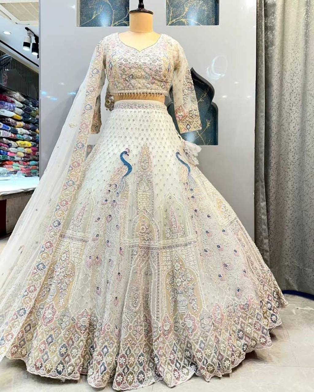 Ethereal Elegance 5 Meter Flared Soft Net Lehenga with Embroidery Sequins Work & Butterfly Net Blouse